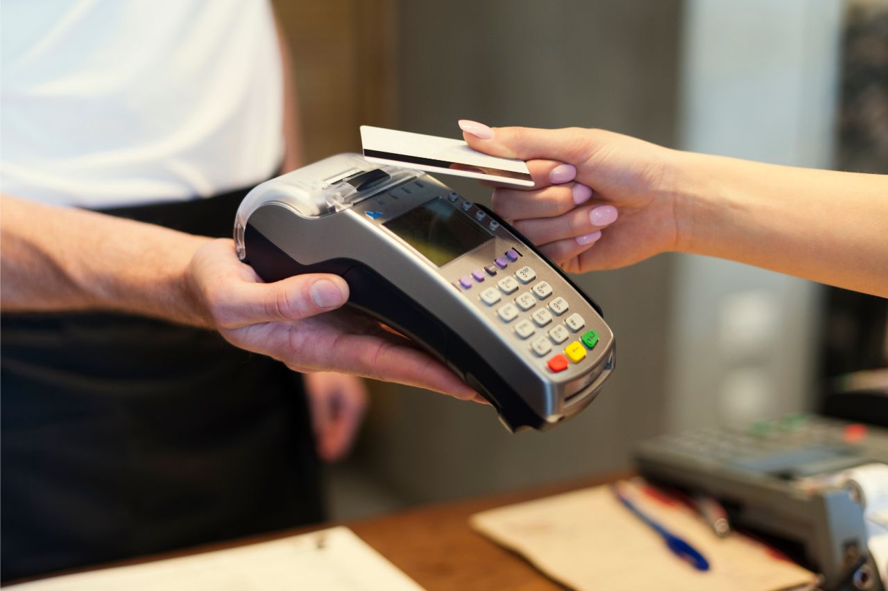 A person about to pay via credit card