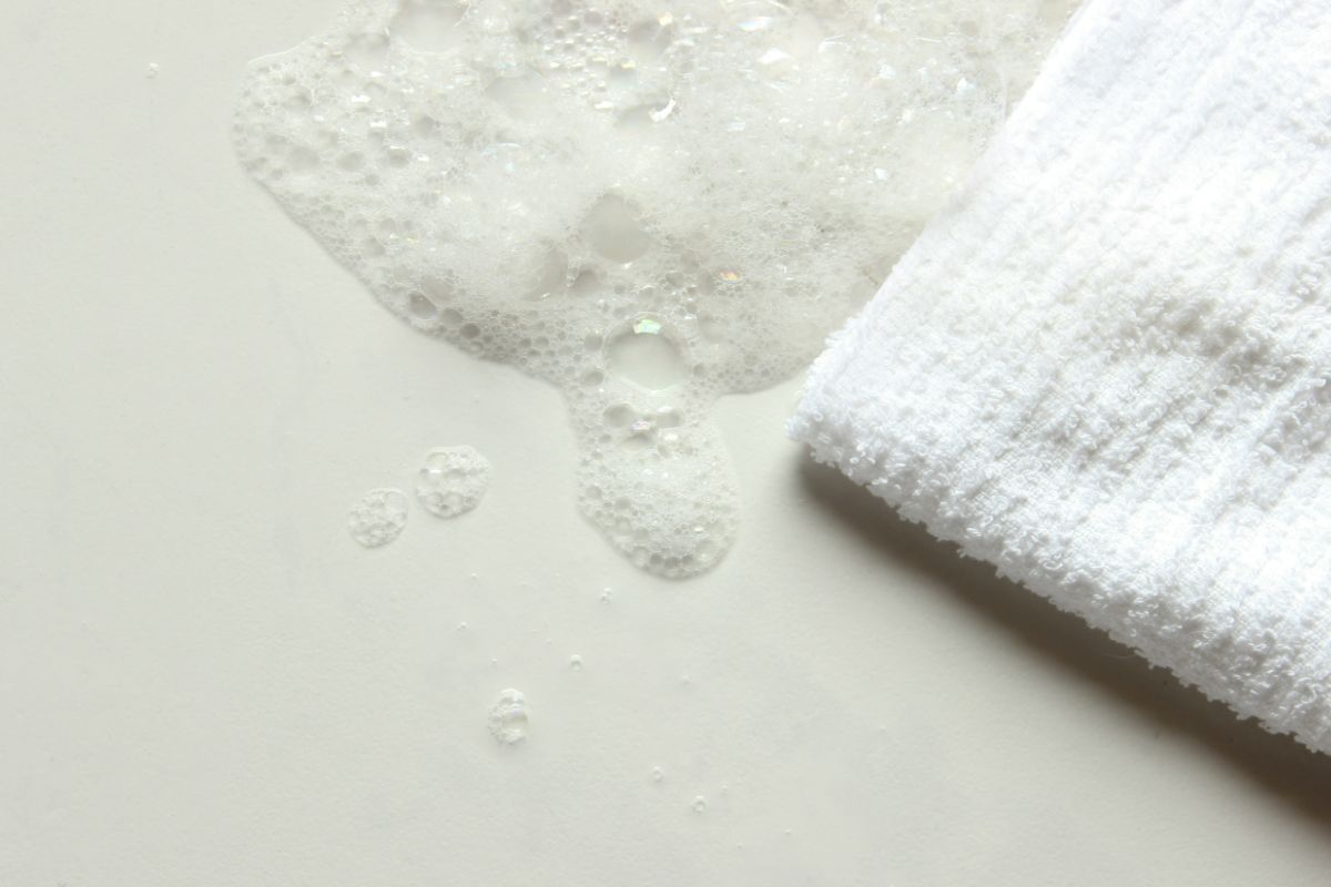 Dip a cloth in the cleaning solution