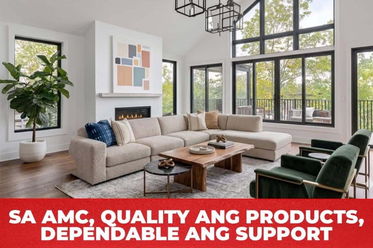 Living room with large black aluminum-framed windows and doors, featuring AMC product support banner